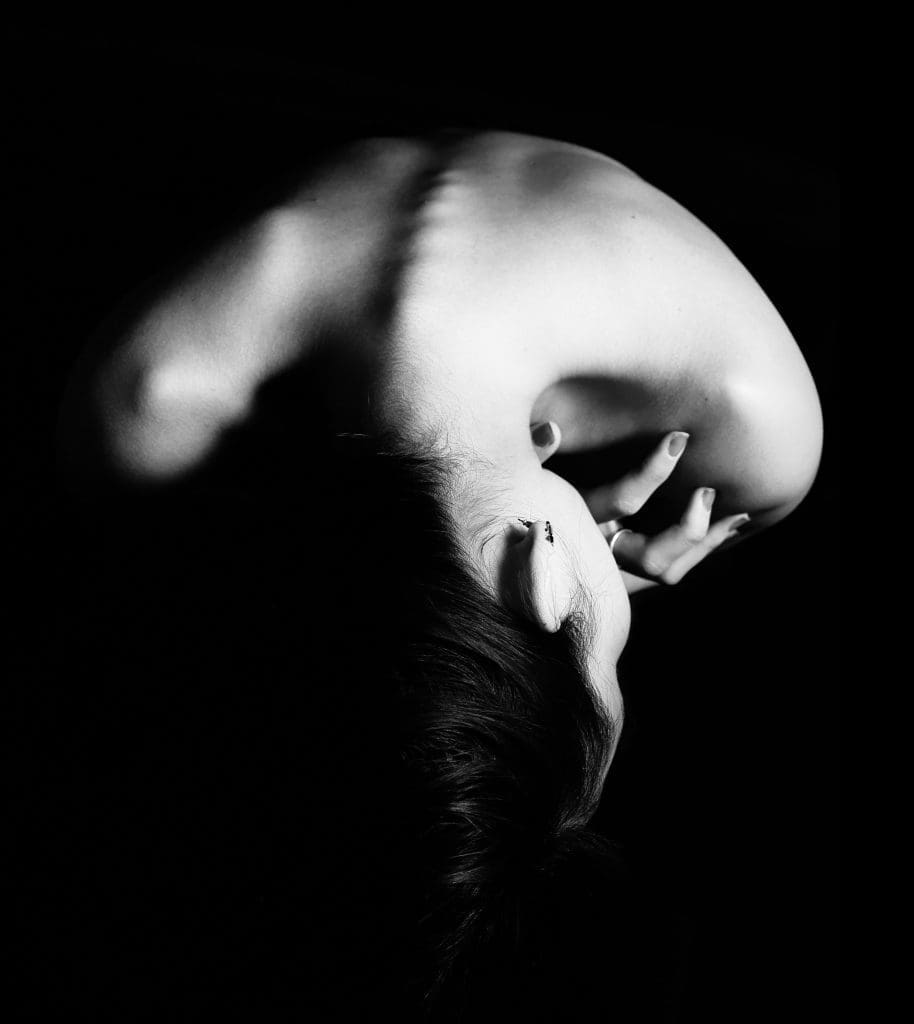A woman with her back turned.