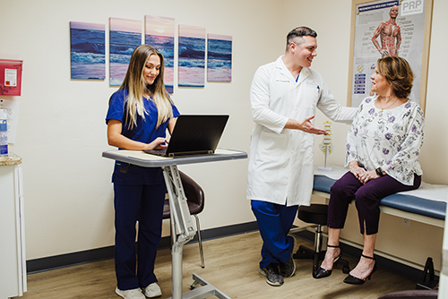 Dr Henriquez with Patient
